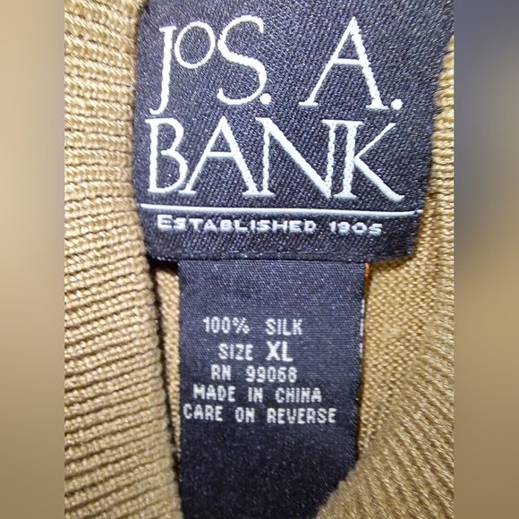 A Jos.A.Bank men's 100% silk long sleeve Camel Color sweater in an XL. - Picture 3 of 5